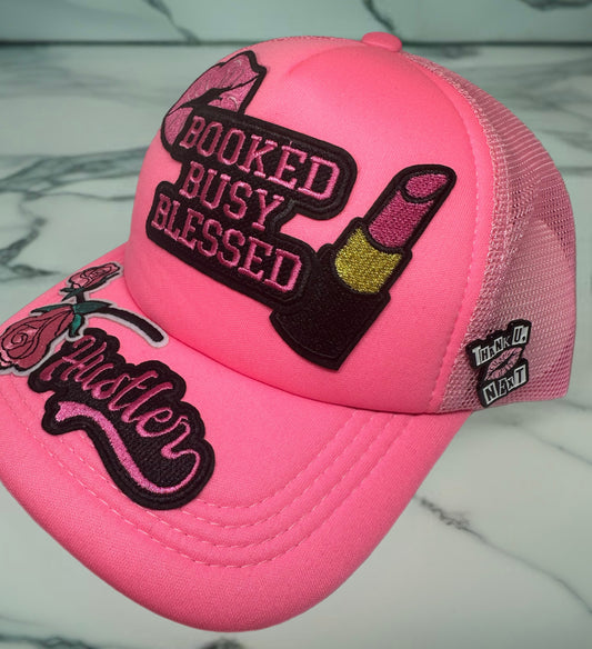 "Booked, Busy, Blessed" Pink Trucker Hat